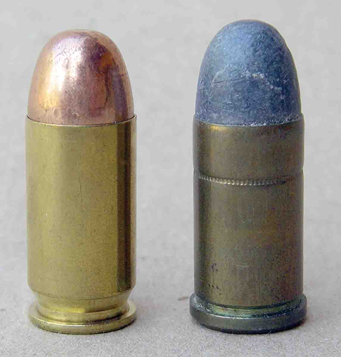 The .45 ACP (left) is rimless and fails to eject from revolvers, whereas the .45 Auto Rim (right) features a generous rim to facilitate ejection.